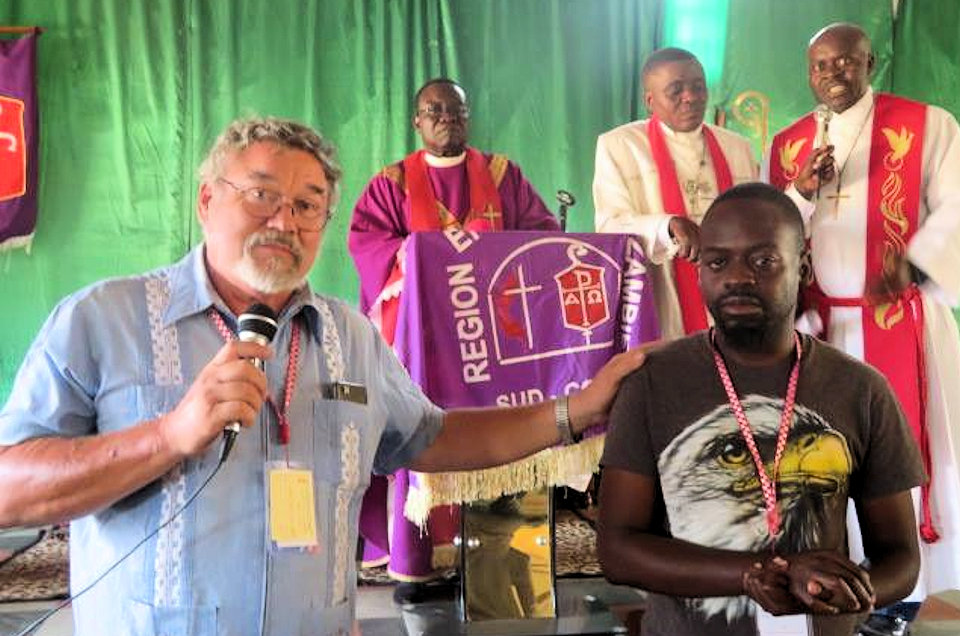 Missionary Paul Webster introduces his successor at Mujila Falls Centre.