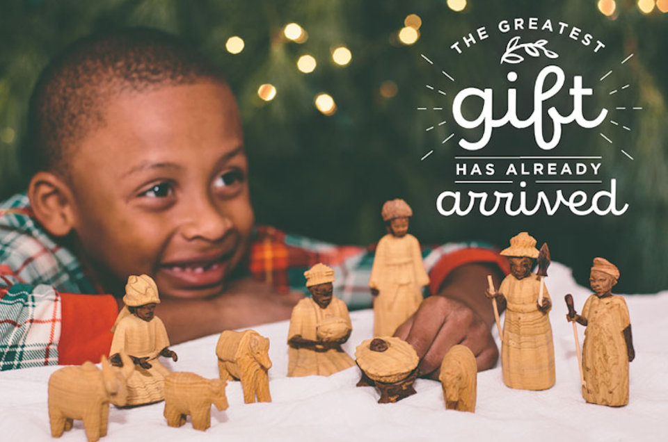 Boy with Nigerian nativity set