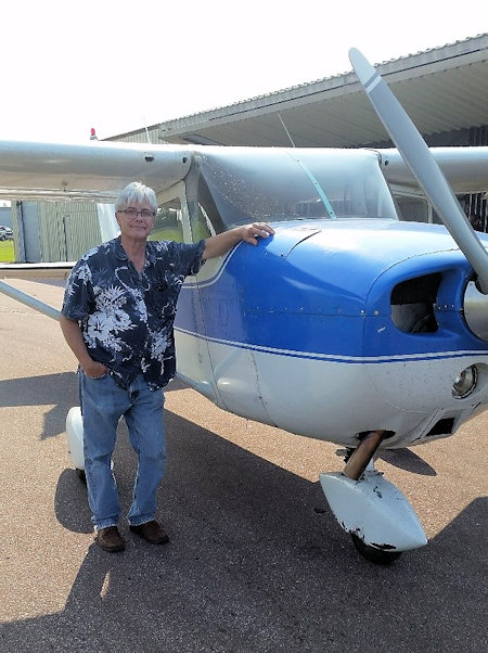 Jerry DeVine next to plane