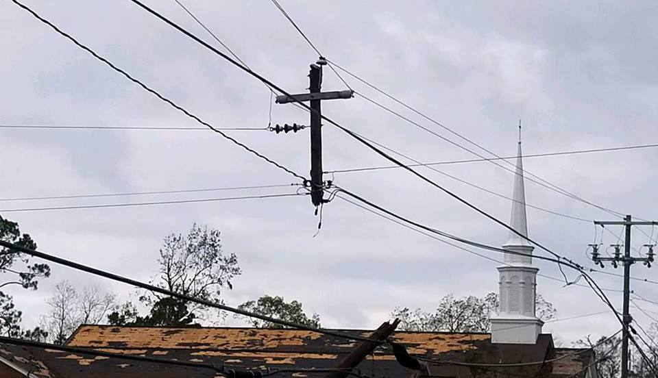 Utility pole shaped like cross