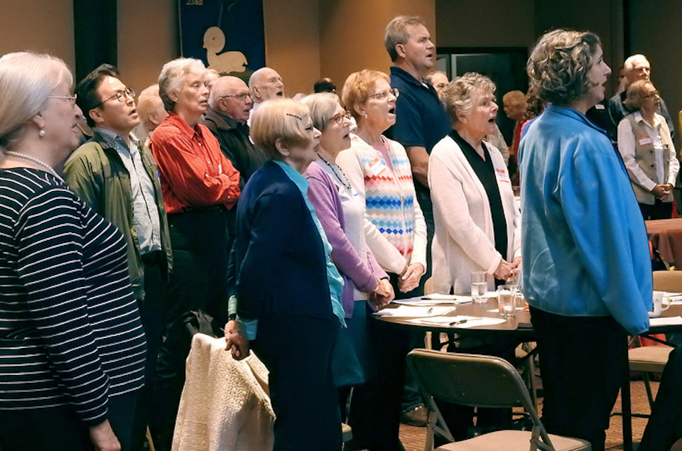 Hymn singing at a Minnesota-Dakotas Area session