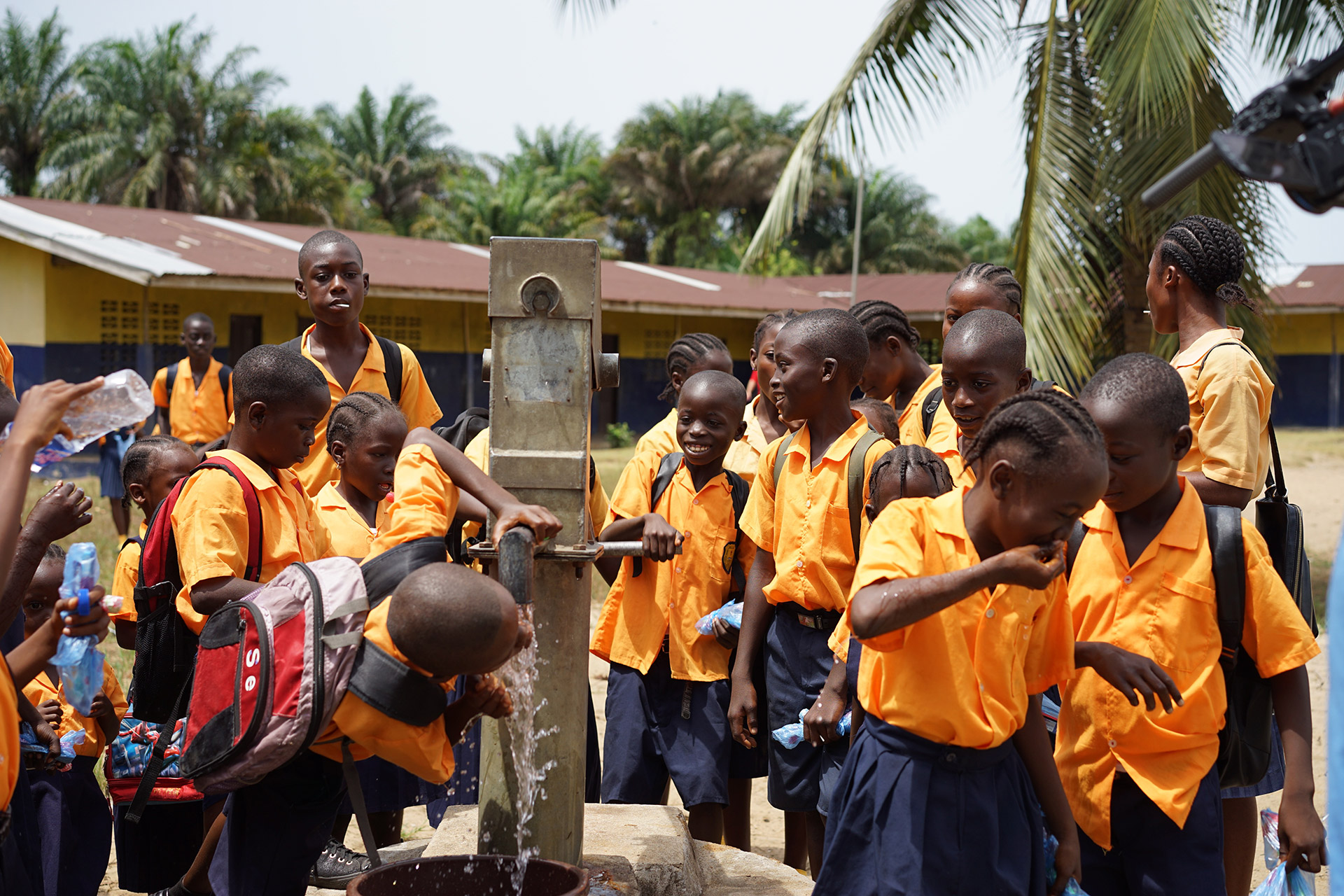 Liberian children drinking clean water