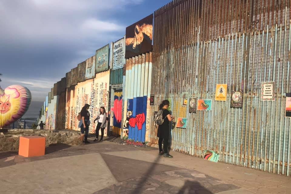 JFON Michigan staff at border wall between Mexico and U.S.