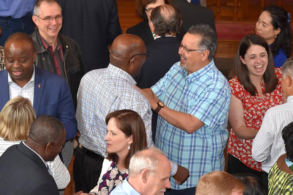 Members of the Commission on A Way Forward mingle