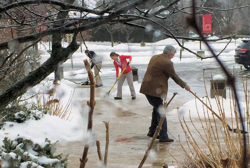 Pastors shoveling snow