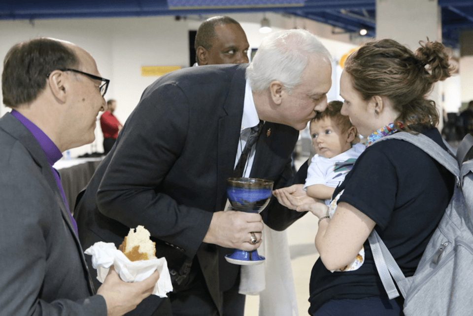 Bishops Bard and Bickerton serve Communion during Day of Prayer on Saturday, Feb. 23, 2019