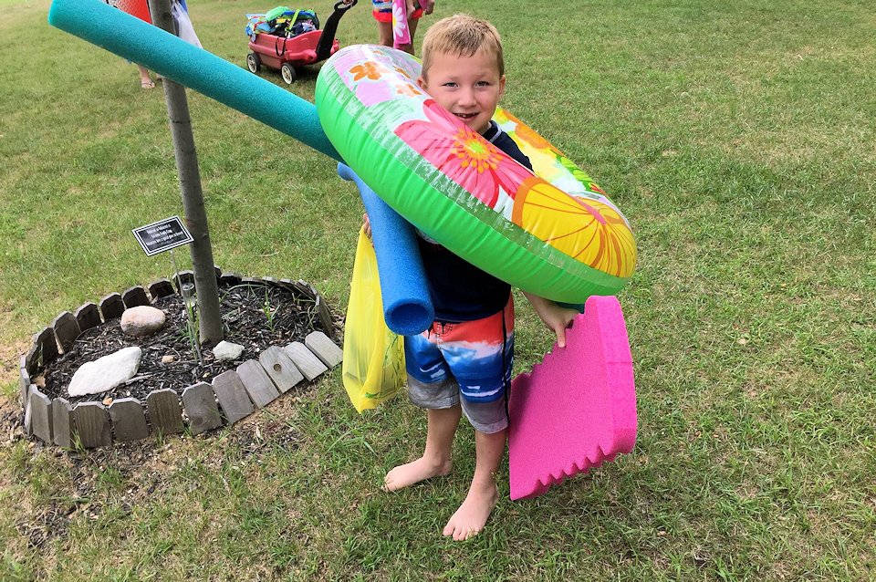 Young boy ready to swim at Lakeview Camp