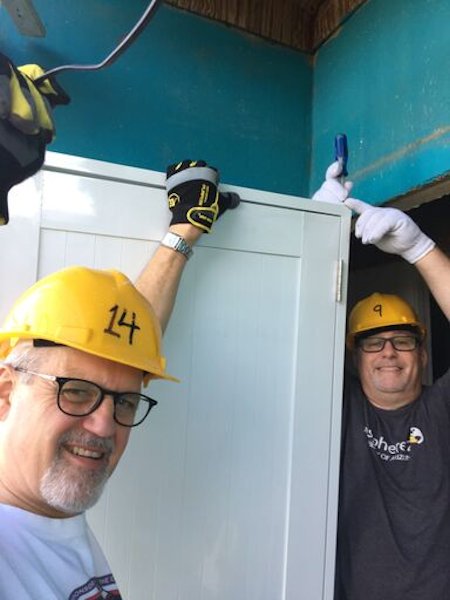 East Winds volunteers work on a home damaged by Hurricane Maria