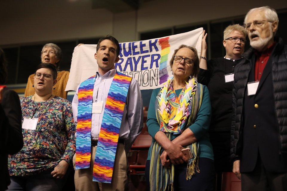 LGBTQ persons at Prayer Station at General Conference