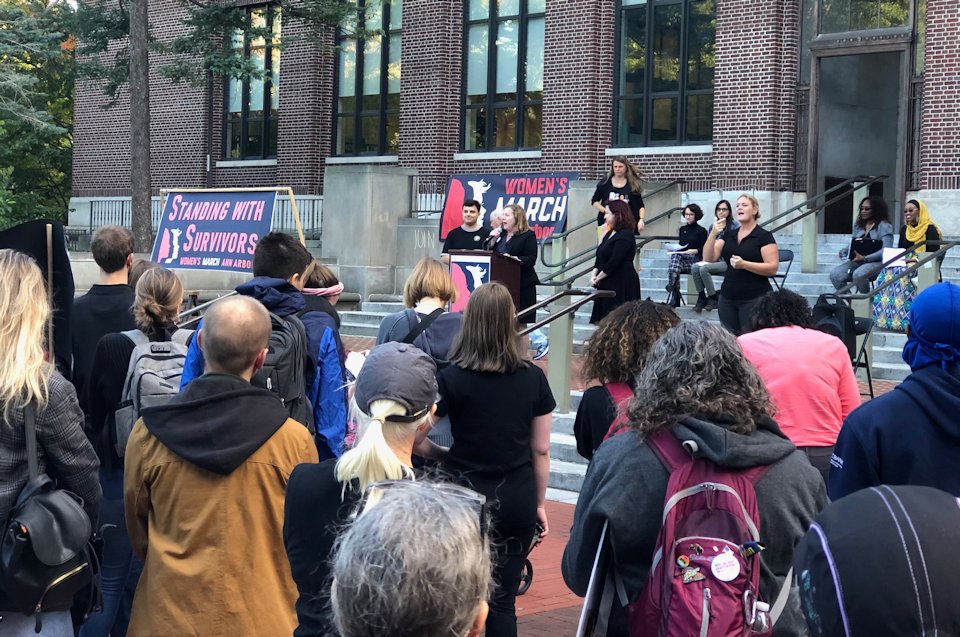 Students participate in a Women's March in Ann Arbor.