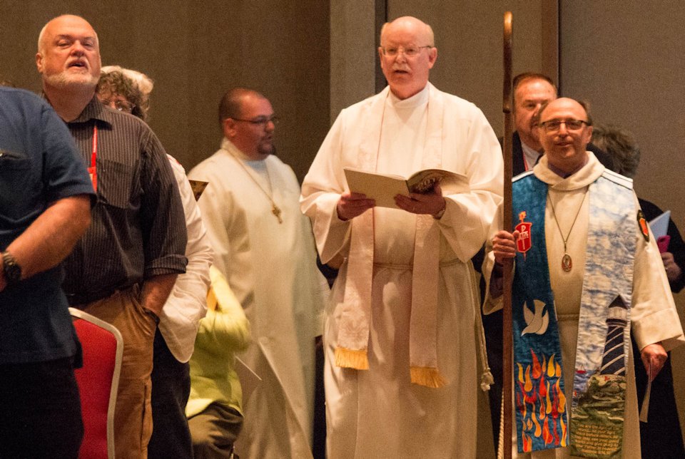 Bishop Bard and Rev. John Boley process during worship