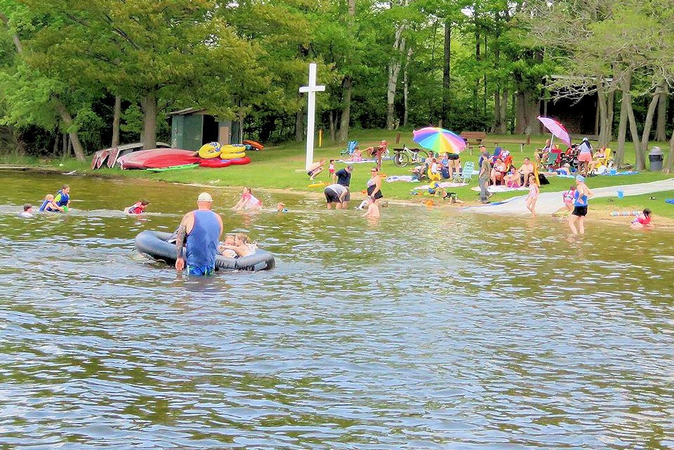 Families at beach at Lakeview Camp