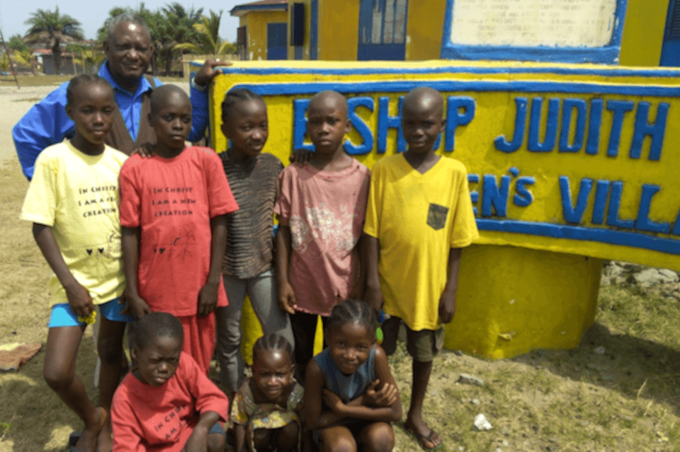 Robert Sieh with orphans at the Judith Craig Children's Village