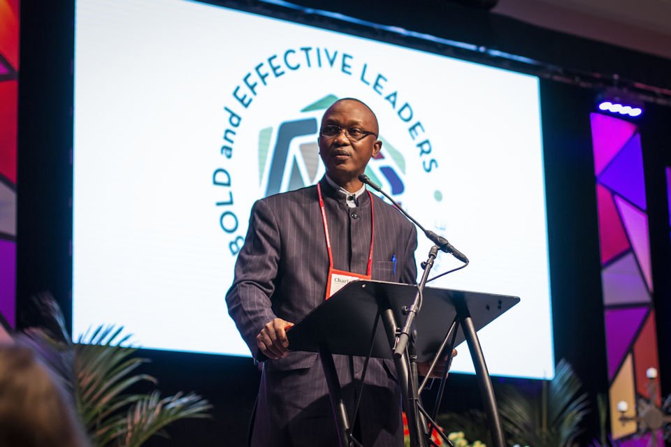 Charles Boayue at the microphone