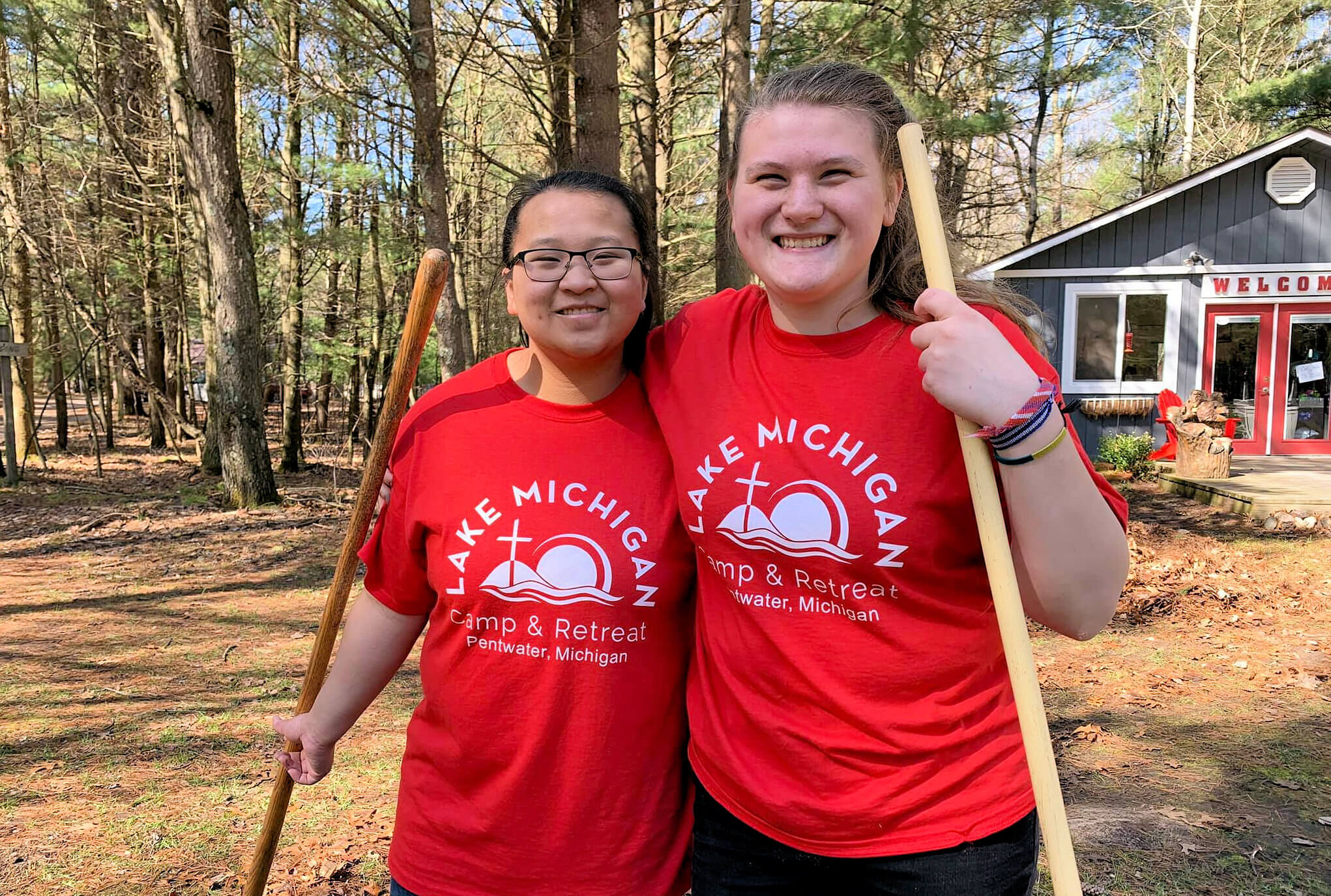Girls cleaning up Lake Michigan site for camping in 2019