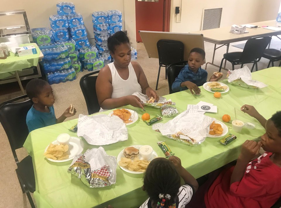 Family sharing a meal in a church