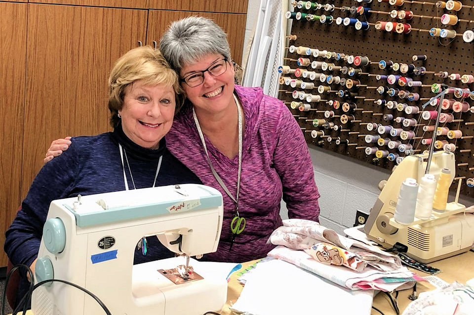 Women at sewing machine