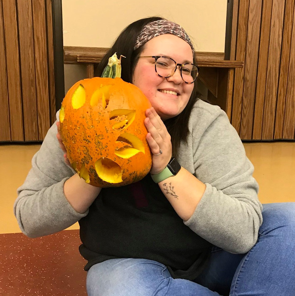 Woman with pumpkin