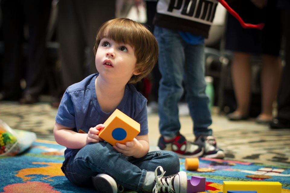 Small child at Annual Conference