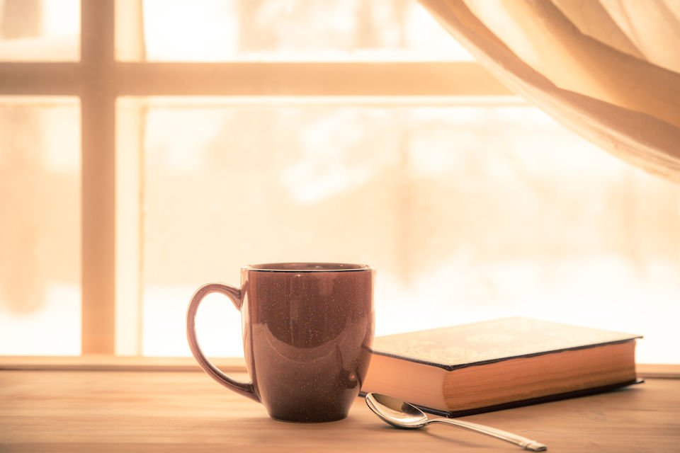 Coffee mug and Bible. Quiet life.