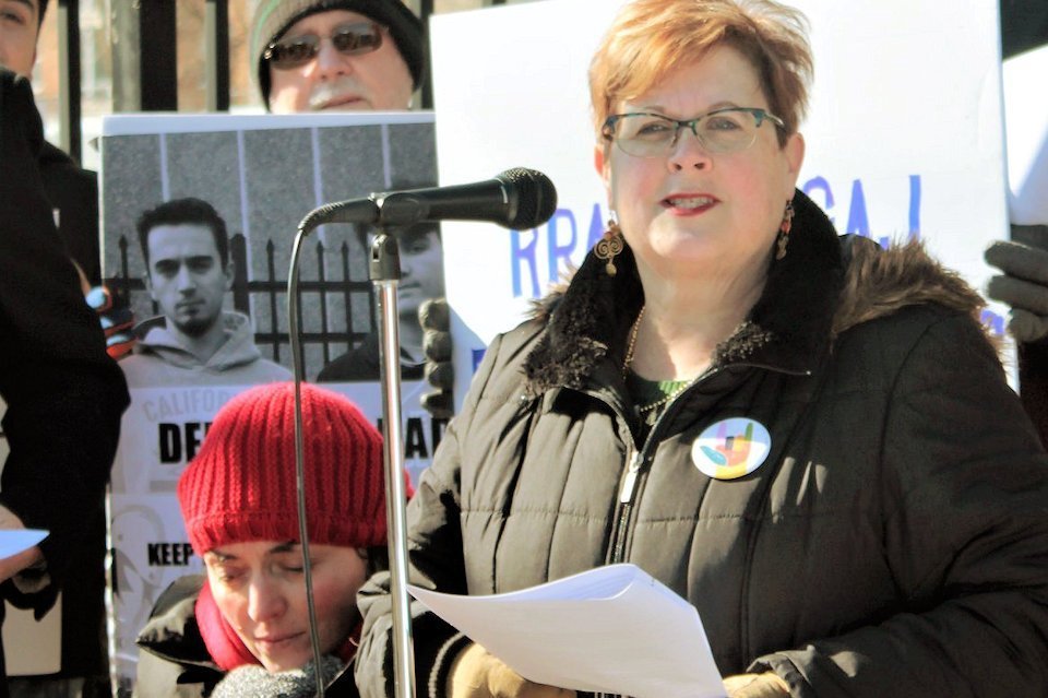 Rev. Jill Hardt Zundel advocating for the Albanian family living at Central UMC in Detroit where she pastors.