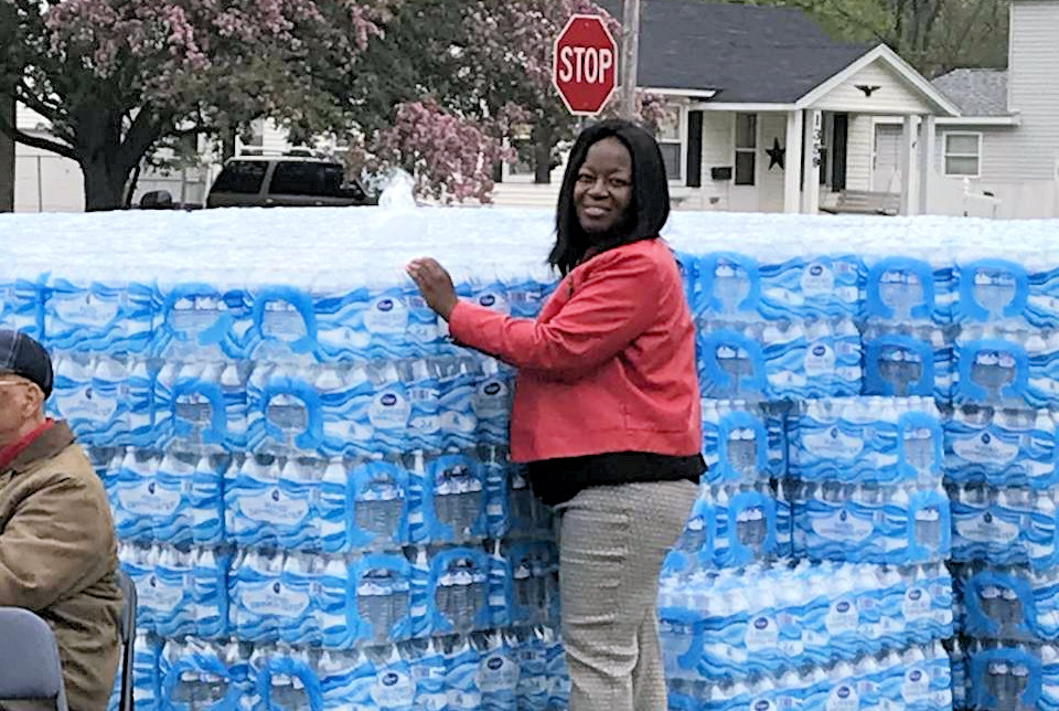 Loads of bottled water are still seen in parking lots three times a week