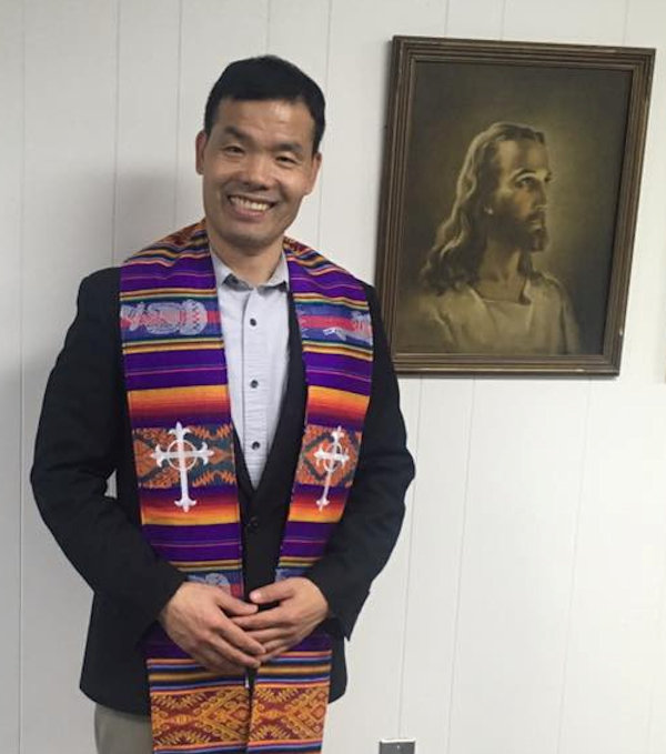Pastor Cloud Pyo and the stole given by his congregation