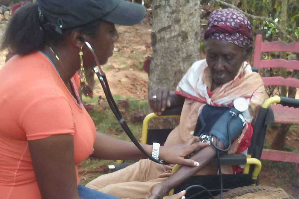Woman taking blood pressure 