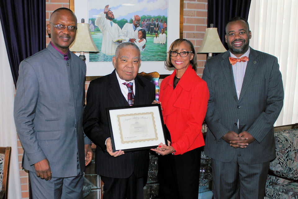 Tony Shipley receives the certificate