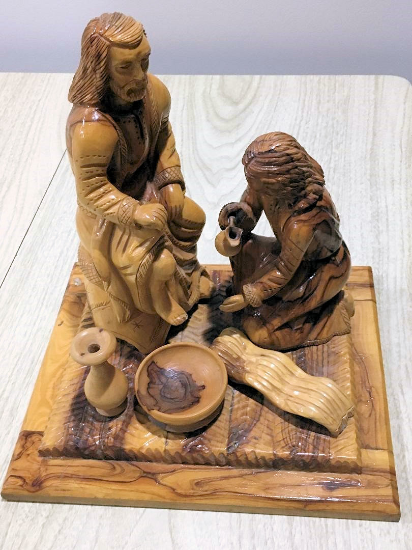 Carving of Jesus washing feet