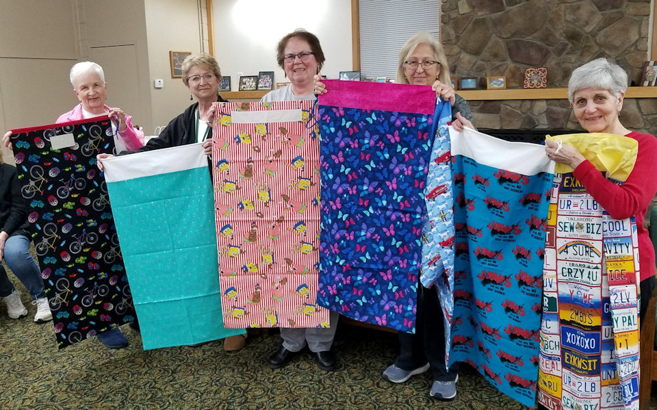 women with quilts