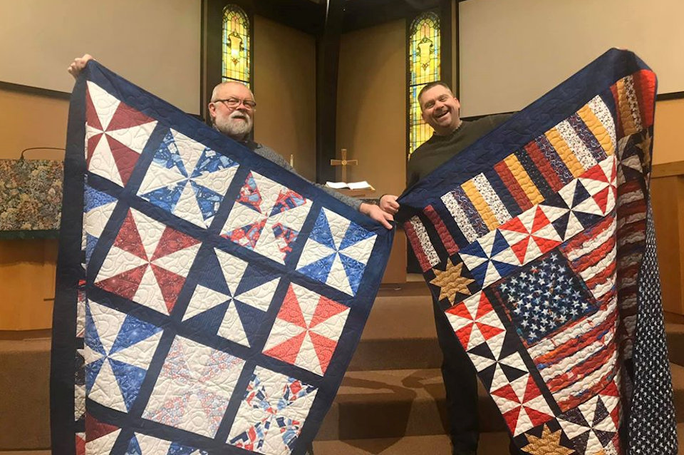 Men with quilts