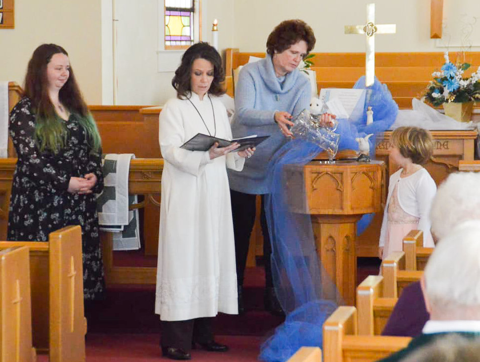 Aubrey and family in worship