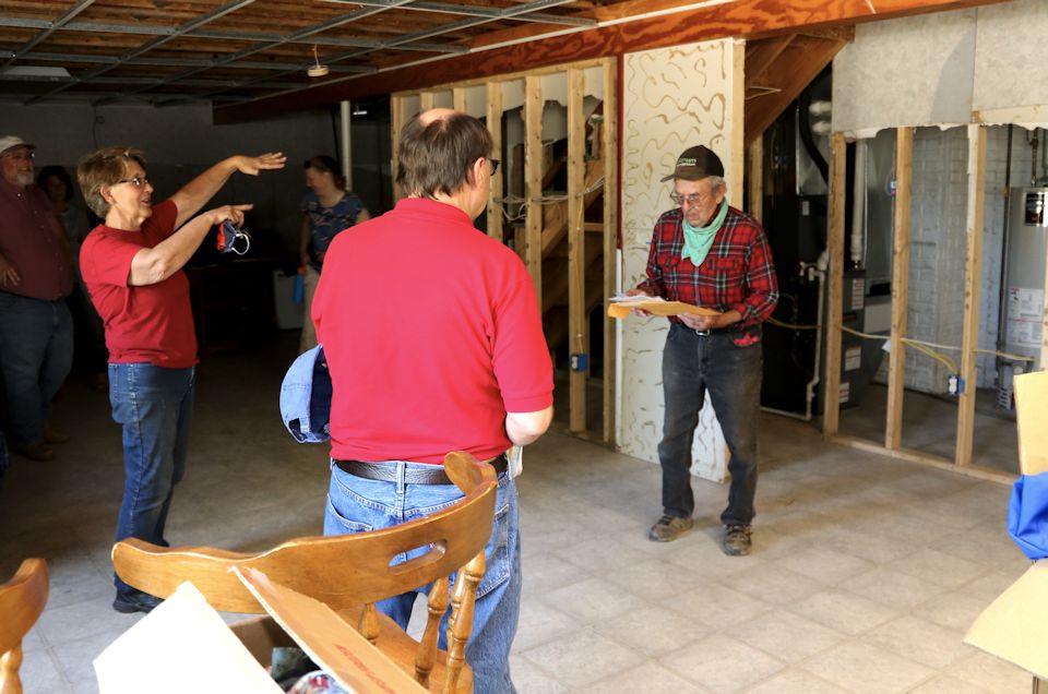 Man shows basement damage