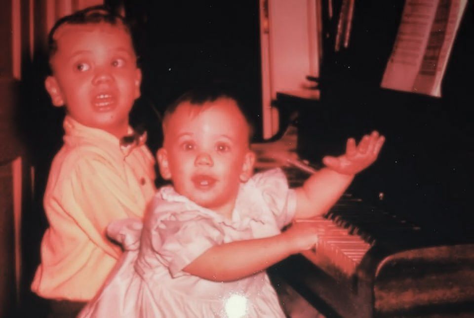 Laurie Haller singing with her brother