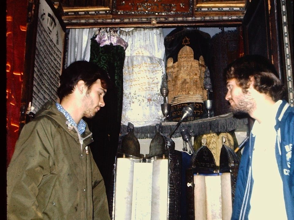 Glenn Wagner and friend view Torah scrolls in Egypt.