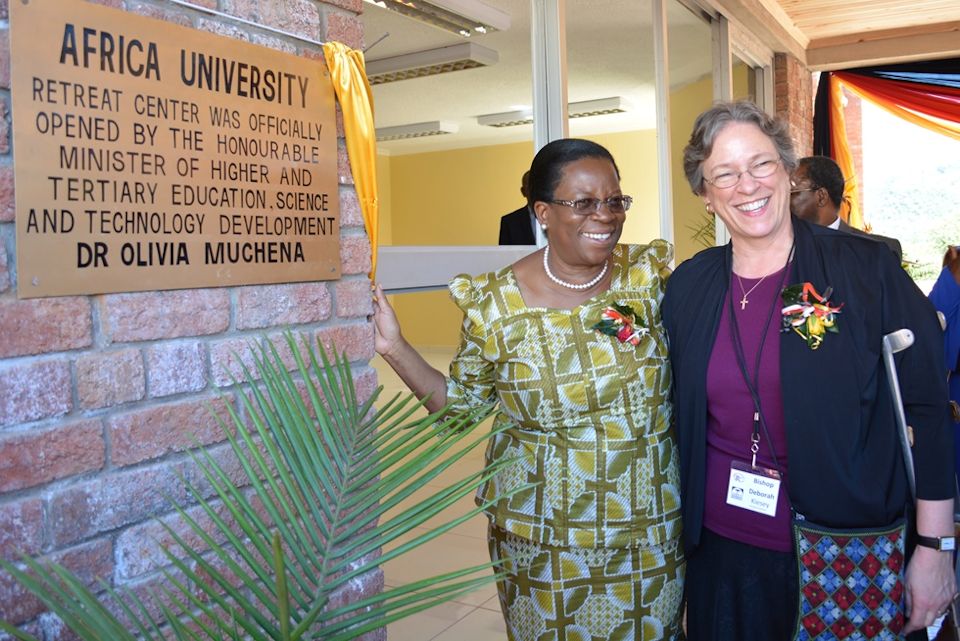 Bishop Kiesey, missionaries, and others at AU in 2014