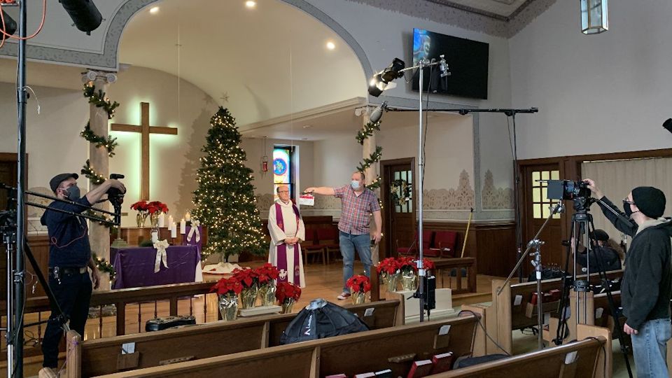 Bishop Bard taping the Dec. 24th Service.