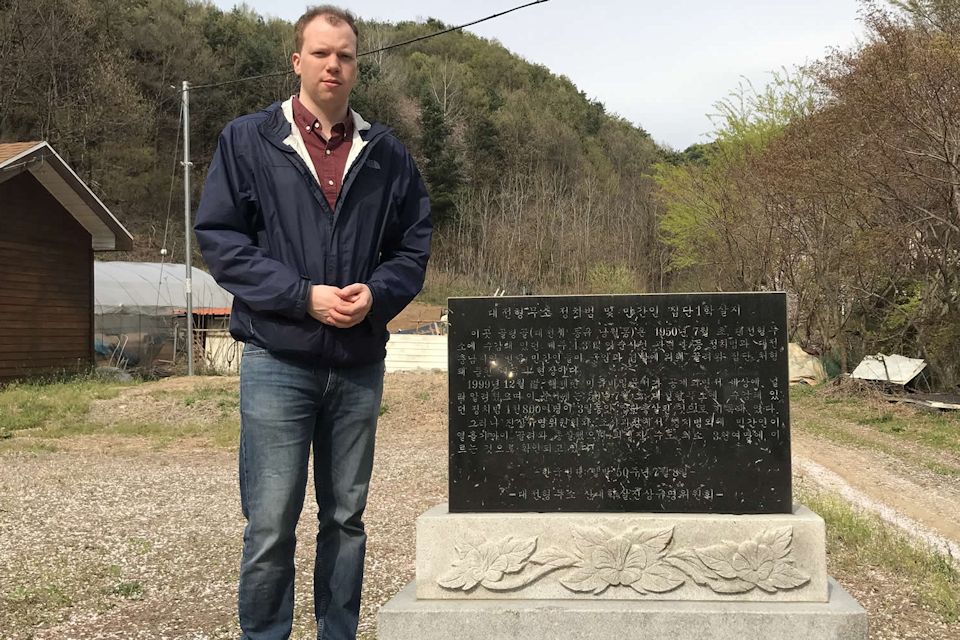 Adam Shaw at massacre memorial in Korea