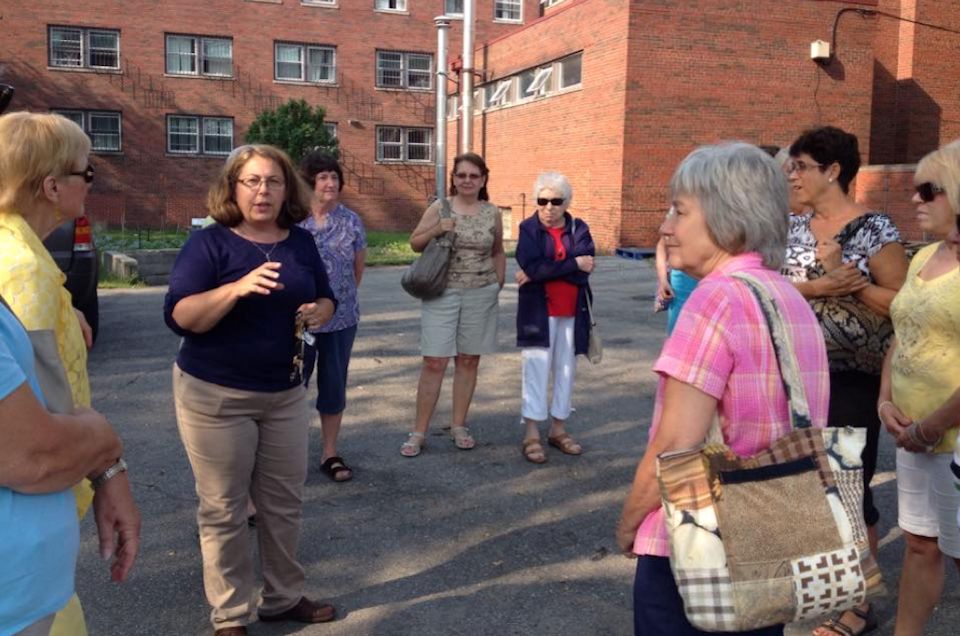 Deacon Sue Pethoud with group of volunteers