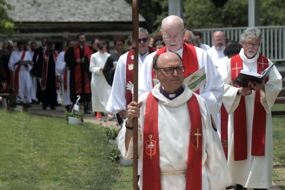 Alive in Christ, the Bishop leads a processional at the Service of Recognition, Commissioning, and Ordination.