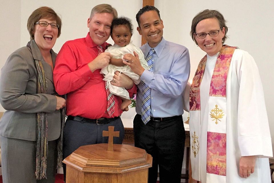 Alice celebrating a baptism