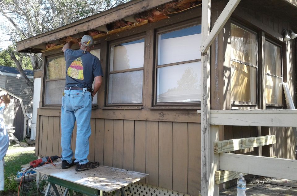 UM Men work on trailer home