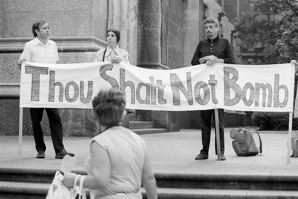 Pastor and peacemaker protesting war 19