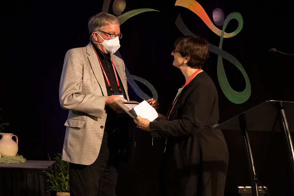 Jim LeBaron accepts the John Buxton Award.