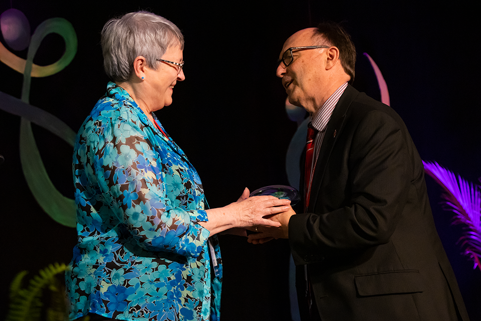 Deacon Kay DeMoss is thanked by Bishop David Bard.