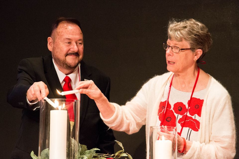 John Wharton and Anne Soles light a unity candle in 2018.