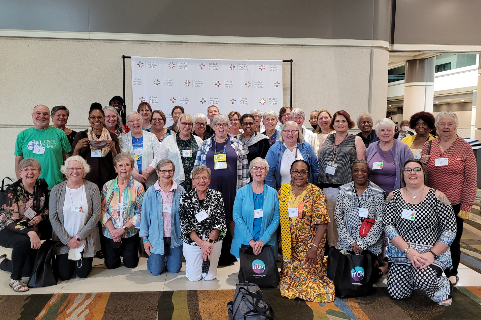 Women from Michigan pose for a photo during Assembly 2022.