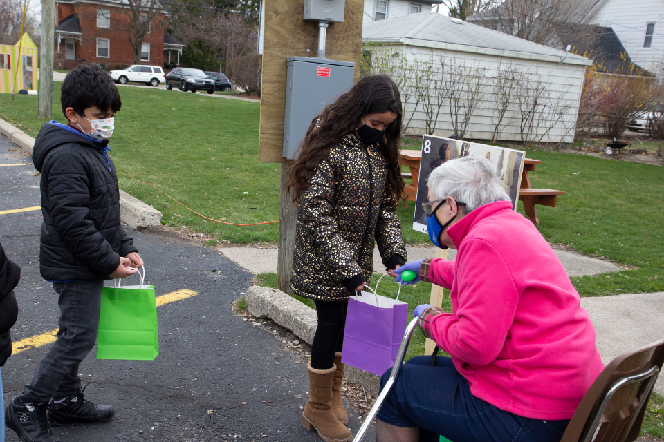 Children participate in Easter StoryWalk.