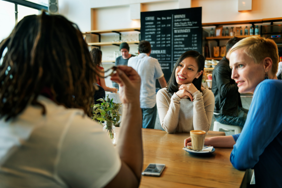 Women chatting at a coffee shop